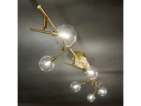 Lampada da parete Maracas in metallo rifinito in ottone satinato con diffusori orientabili in vetro soffiato trasparente di Ideal Lux